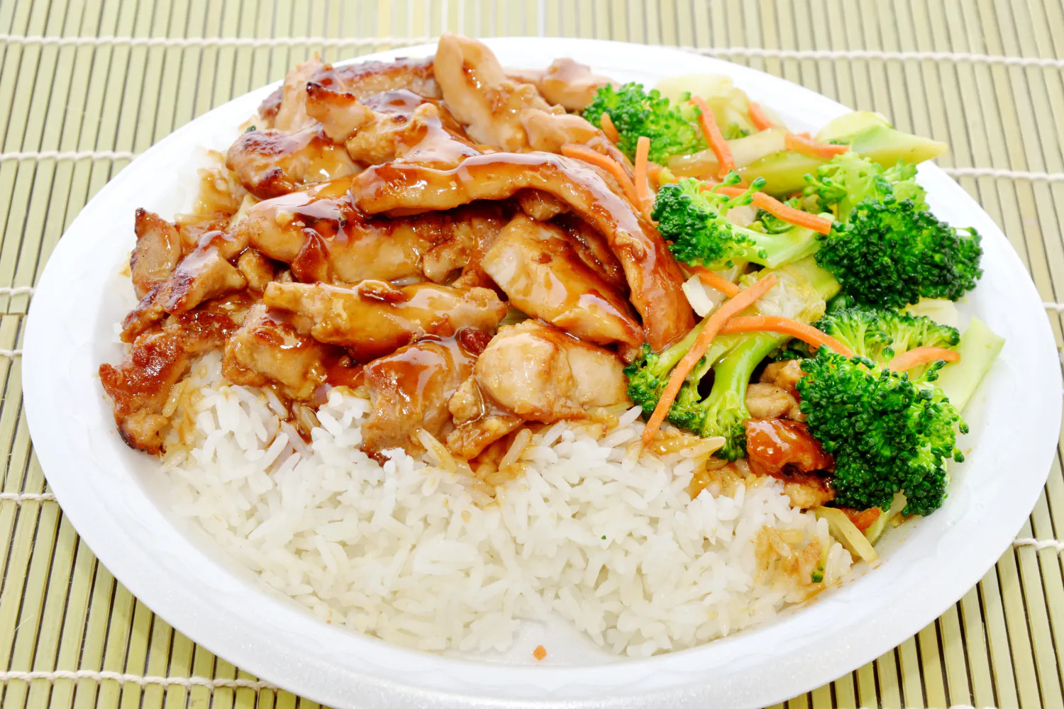Teriyaki chicken rice with broccoli and carrot strips at Suki Hana, a Japanese Restaurant in Moorestown